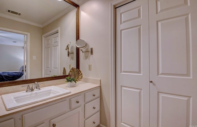 2200 Andover Ct, Little Rock, AR 72227 - bathroom featuring visible vents, ornamental molding, and vanity