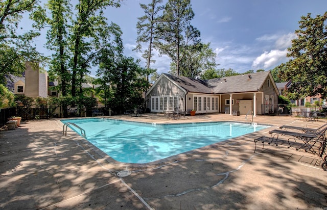 2200 Andover Ct, Little Rock, AR 72227 - pool with a patio area, fence, and french doors