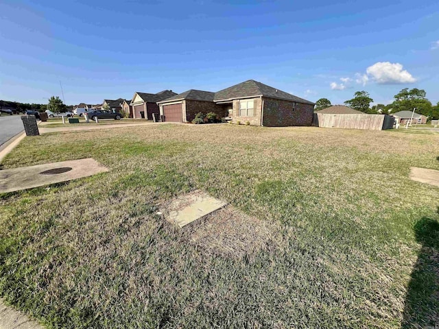 4630 Bedrock Dr, Jonesboro, AR 72404 - view of yard featuring a garage