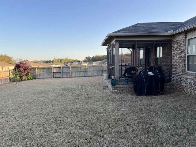 4630 Bedrock Dr, Jonesboro, AR 72404 - view of yard with a fenced backyard and a sunroom