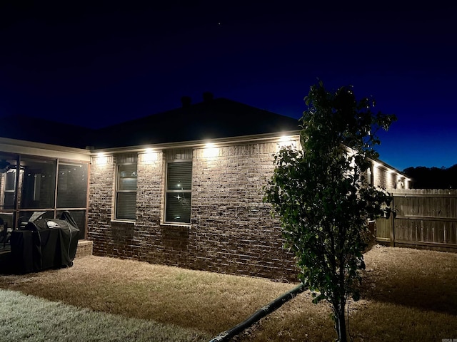 4630 Bedrock Dr, Jonesboro, AR 72404 - property exterior at twilight featuring fence