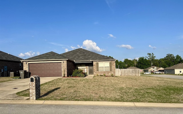 4630 Bedrock Dr, Jonesboro, AR 72404 - single story home with a front lawn, fence, brick siding, an attached garage, and driveway