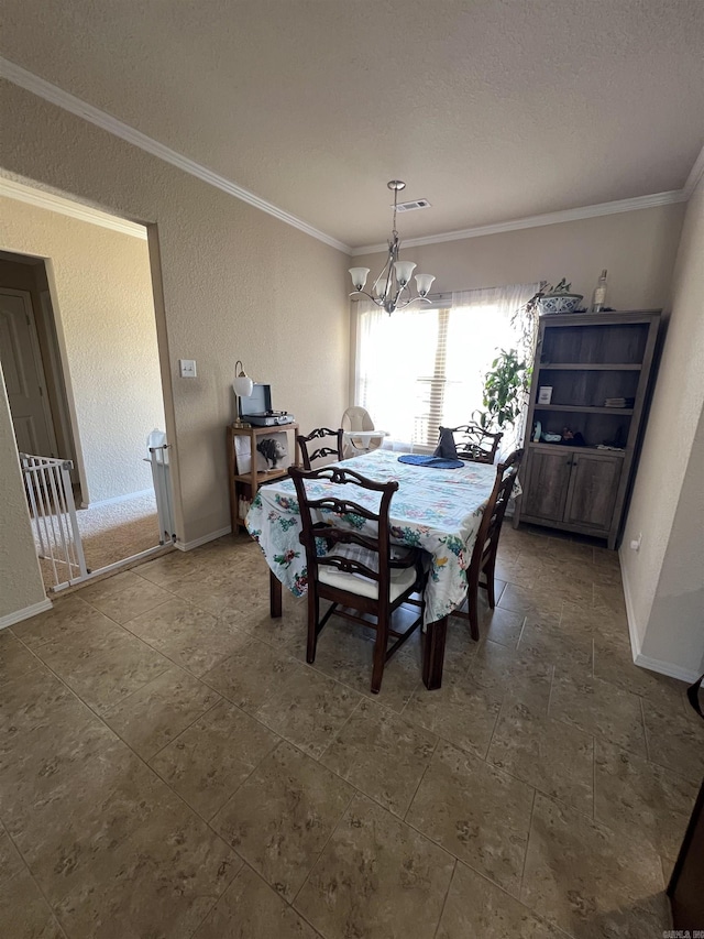 4630 Bedrock Dr, Jonesboro, AR 72404 - dining area with visible vents, ornamental molding, baseboards, and a chandelier