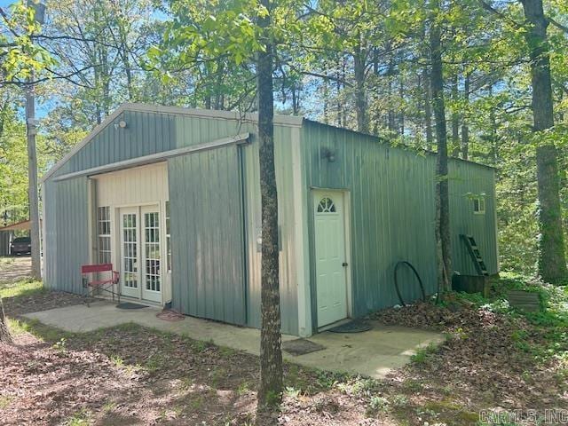 view of outbuilding featuring french doors