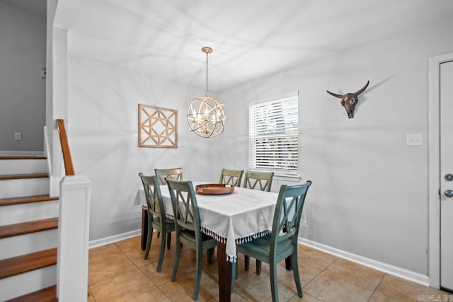 dining room with baseboards, a notable chandelier, light tile patterned floors, and stairway