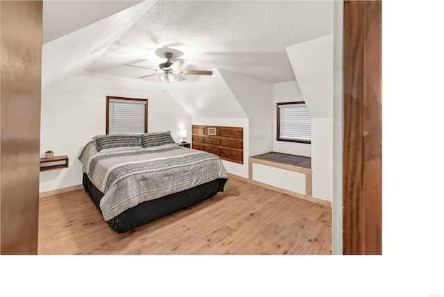 190 Polk Road 624, Mena, AR 71953 - bedroom with a ceiling fan, baseboards, wood finished floors, and lofted ceiling