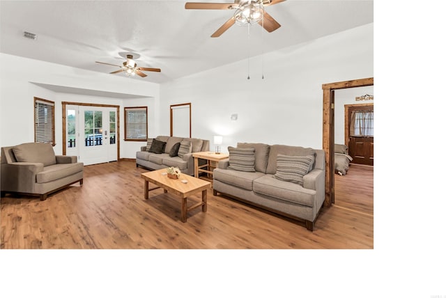 190 Polk Road 624, Mena, AR 71953 - living room with ceiling fan, visible vents, french doors, and light wood finished floors