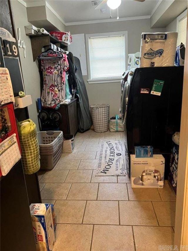 washroom with ornamental molding, laundry area, and a ceiling fan