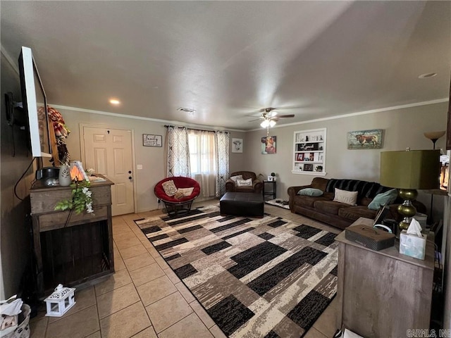 living room featuring crown molding, light tile patterned floors, a ceiling fan, and visible vents