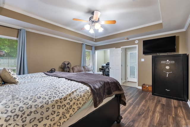 bedroom with crown molding, a ceiling fan, baseboards, and dark wood-style floors