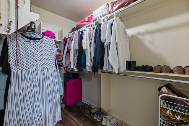 spacious closet with wood finished floors
