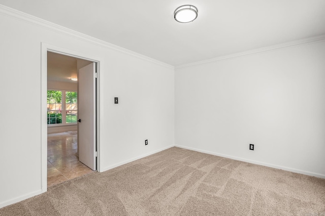 2300 Old Forge Dr, Little Rock, AR 72227 - empty room featuring crown molding, carpet floors, and baseboards