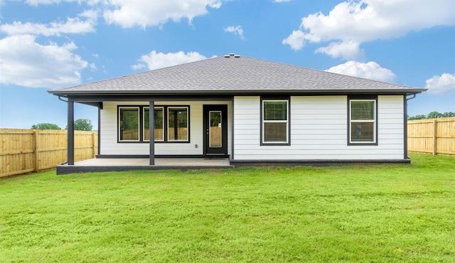 3715 Wise Rd, Bryant, AR 72002 - rear view of house with a fenced backyard, a yard, a patio area, and roof with shingles