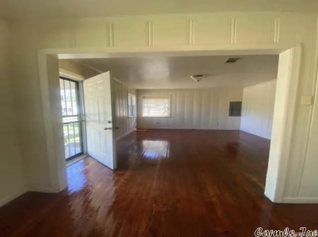 interior space with visible vents and wood finished floors
