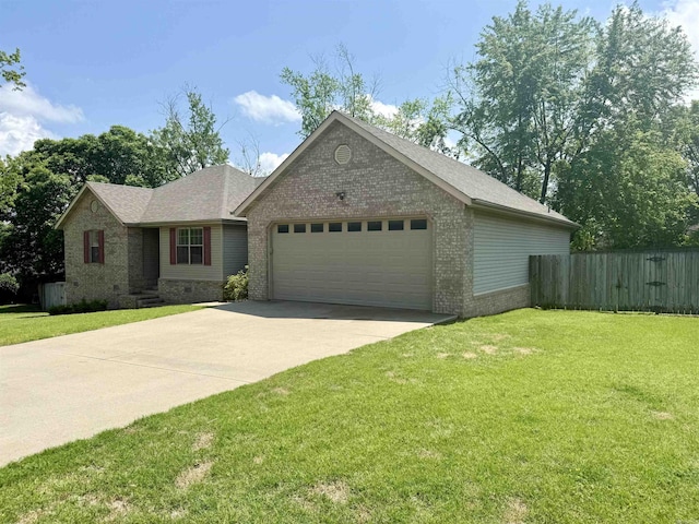 single story home featuring a garage, fence, a front yard, brick siding, and driveway