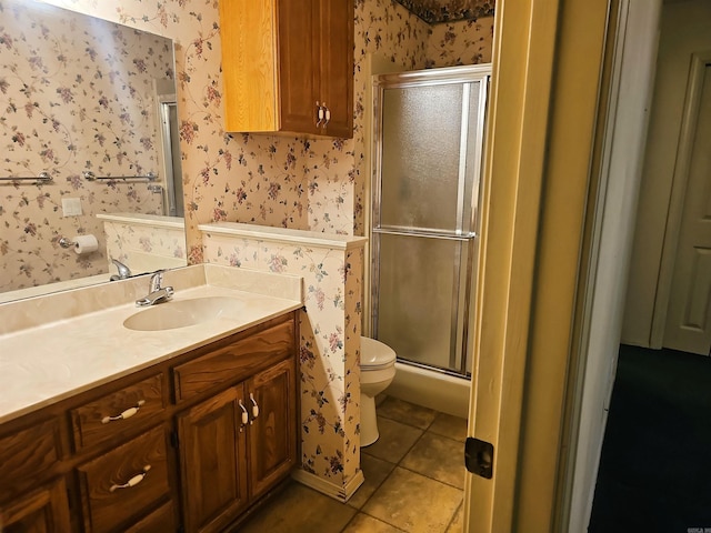 50 Monovar Cir, Hot Springs Village, AR 71909 - full bathroom featuring wallpapered walls, toilet, a shower stall, vanity, and tile patterned floors
