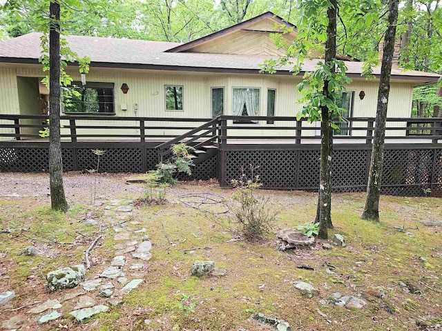 50 Monovar Cir, Hot Springs Village, AR 71909 - rear view of property with a wooden deck and roof with shingles