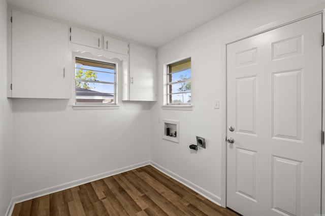 clothes washing area featuring dark wood-style flooring, washer hookup, plenty of natural light, baseboards, and hookup for an electric dryer