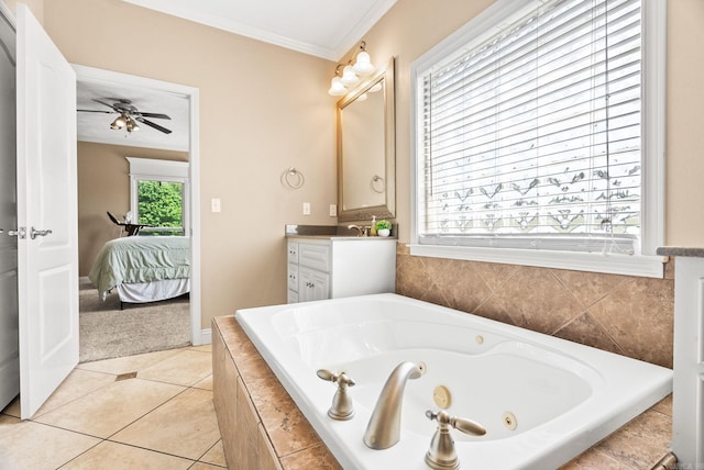 bathroom with crown molding, vanity, ensuite bath, tile patterned floors, and a tub with jets