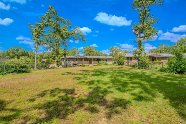 view of yard with fence