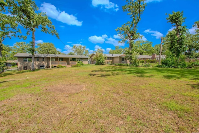 view of yard featuring a deck
