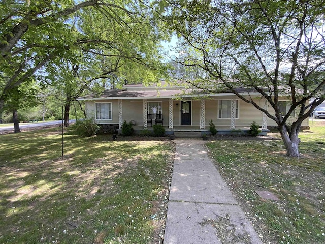 1101 S 8th St, Heber Springs, AR 72543 - ranch-style house featuring a porch and a front yard