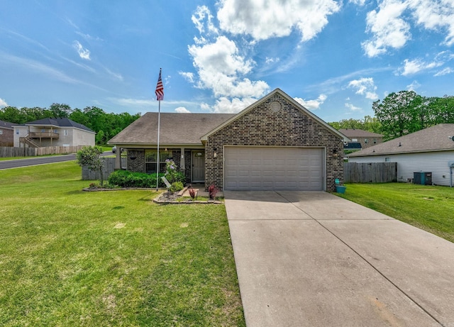 ranch-style home featuring a front lawn, central AC, fence, brick siding, and an attached garage