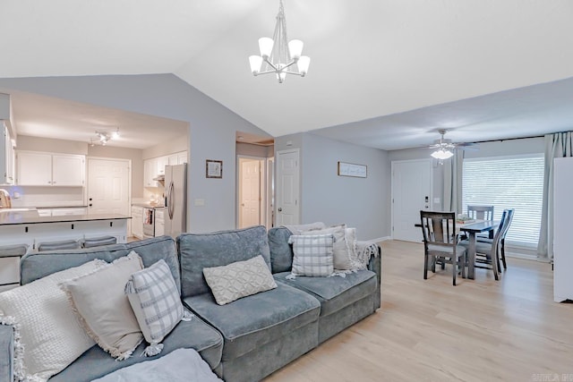 1321 W Front St, Heber Springs, AR 72543 - living room with light wood-type flooring, baseboards, ceiling fan with notable chandelier, and lofted ceiling