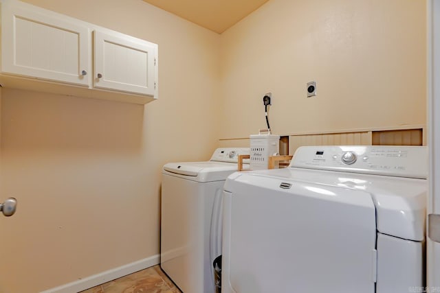 1321 W Front St, Heber Springs, AR 72543 - laundry room featuring separate washer and dryer, baseboards, and cabinet space