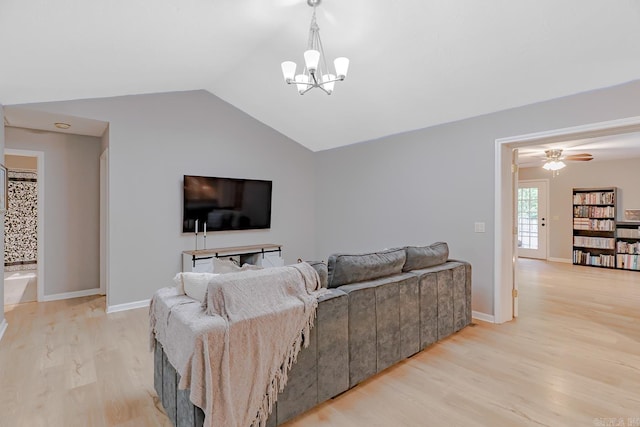 1321 W Front St, Heber Springs, AR 72543 - living room with light wood-type flooring, baseboards, ceiling fan with notable chandelier, and vaulted ceiling