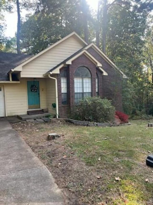 2 Kristin Lynn Dr, Arkadelphia, AR 71923 - ranch-style home with driveway, a front lawn, and a garage