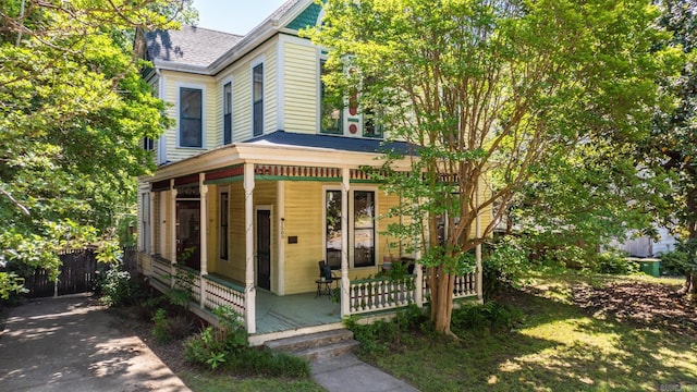 1509 S Spring, Little Rock, AR 72202 - victorian house featuring covered porch, fence, and a shingled roof