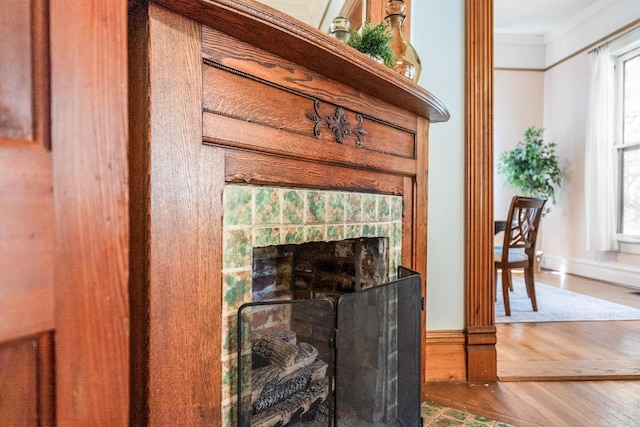 1509 S Spring, Little Rock, AR 72202 - interior details with crown molding, a fireplace with flush hearth, and wood finished floors