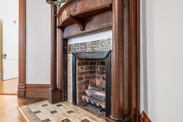 1509 S Spring, Little Rock, AR 72202 - details with baseboards and wood finished floors