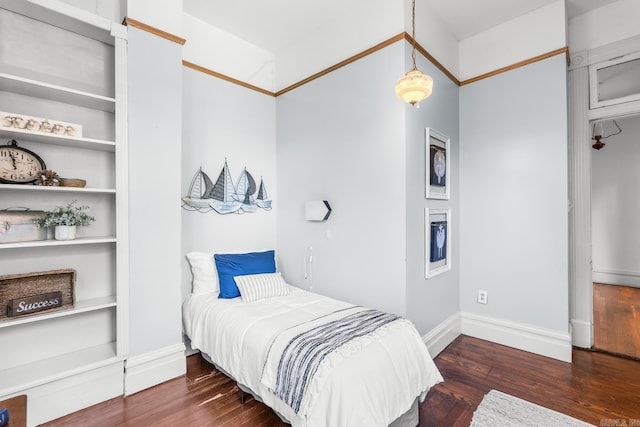 1509 S Spring, Little Rock, AR 72202 - bedroom featuring baseboards and wood finished floors