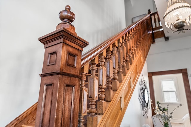 1509 S Spring, Little Rock, AR 72202 - stairs with baseboards, a towering ceiling, and a notable chandelier