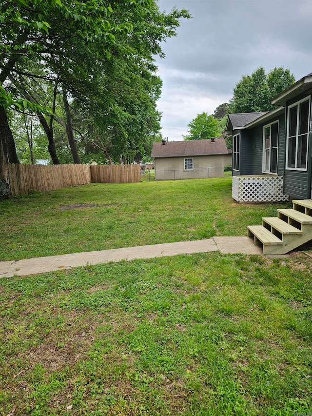 view of yard with fence