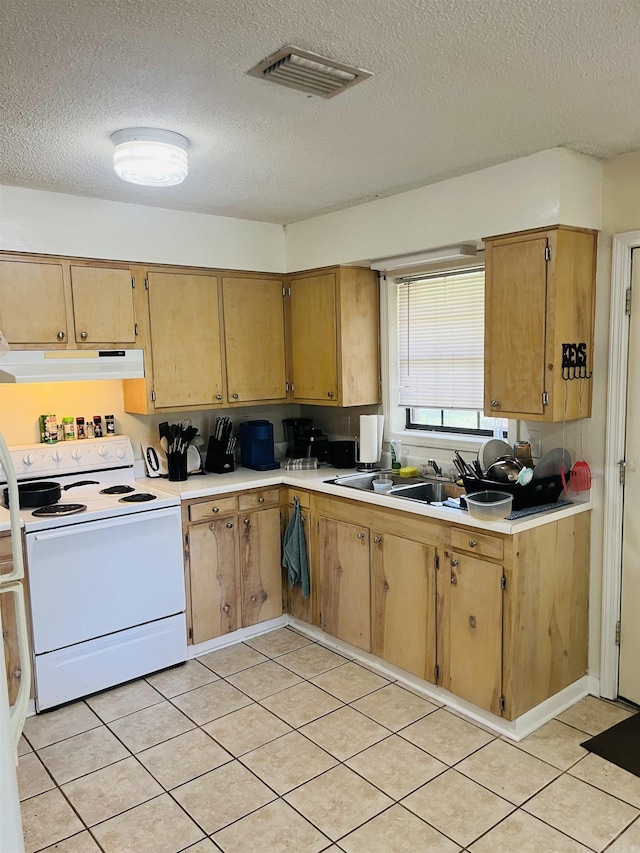 kitchen with visible vents, electric range, light countertops, a textured ceiling, and under cabinet range hood