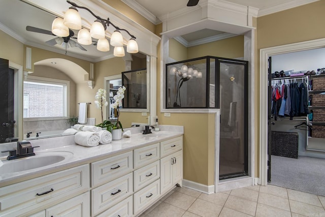 9241 Johnson Dr, Sherwood, AR 72120 - bathroom with a walk in closet, a sink, tile patterned flooring, a ceiling fan, and a stall shower