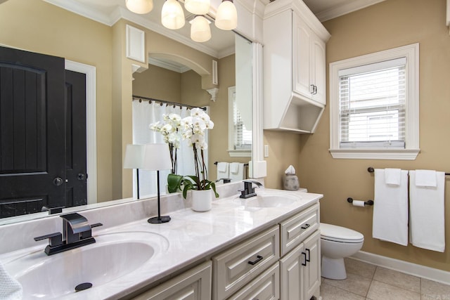 9241 Johnson Dr, Sherwood, AR 72120 - bathroom with a sink, ornamental molding, and toilet