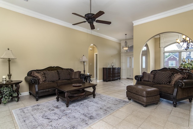 9241 Johnson Dr, Sherwood, AR 72120 - living room featuring crown molding, arched walkways, tile patterned flooring, baseboards, and ceiling fan with notable chandelier