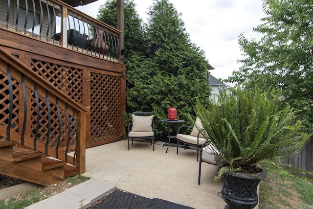 9241 Johnson Dr, Sherwood, AR 72120 - view of patio / terrace featuring a wooden deck and fence