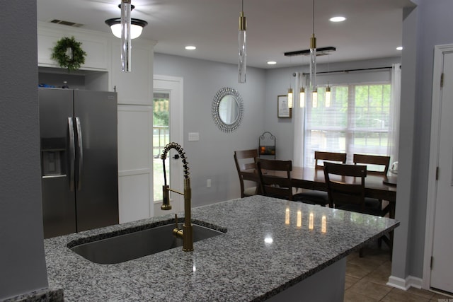 24076 Gracie Layne Ln, Bauxite, AR 72011 - kitchen featuring visible vents, a sink, tile patterned floors, stone countertops, and stainless steel fridge