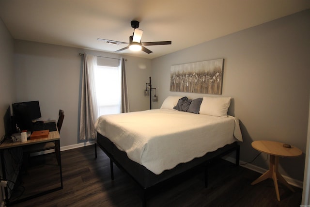 24076 Gracie Layne Ln, Bauxite, AR 72011 - bedroom featuring baseboards, dark wood finished floors, ceiling fan, and visible vents