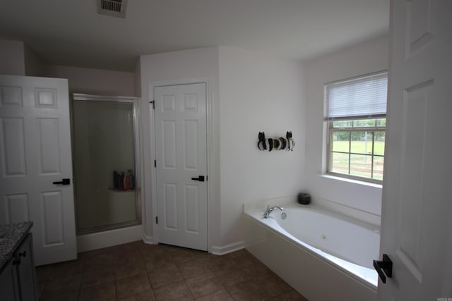 24076 Gracie Layne Ln, Bauxite, AR 72011 - bathroom featuring visible vents, a shower stall, a bath, and vanity