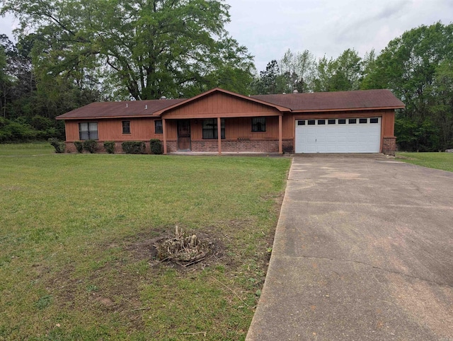 single story home featuring a garage, covered porch, a front yard, brick siding, and concrete driveway