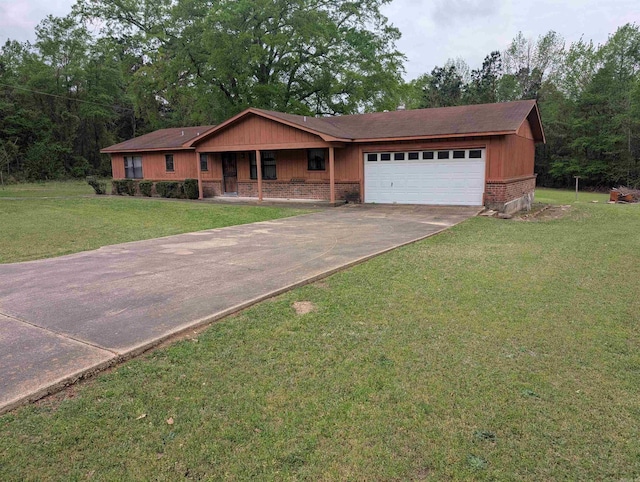 ranch-style home featuring a porch, driveway, a front yard, a garage, and brick siding