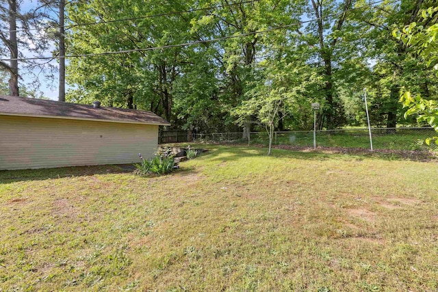 view of yard with fence
