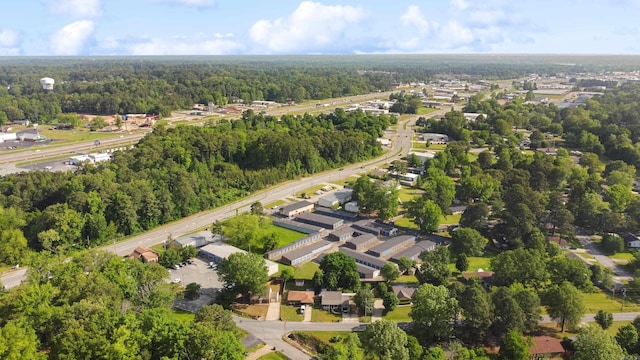 bird's eye view featuring a wooded view