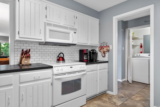 350 Peters Pt Unit L1, Hot Springs, AR 71913 - kitchen with dark countertops, white appliances, washer / clothes dryer, white cabinetry, and backsplash